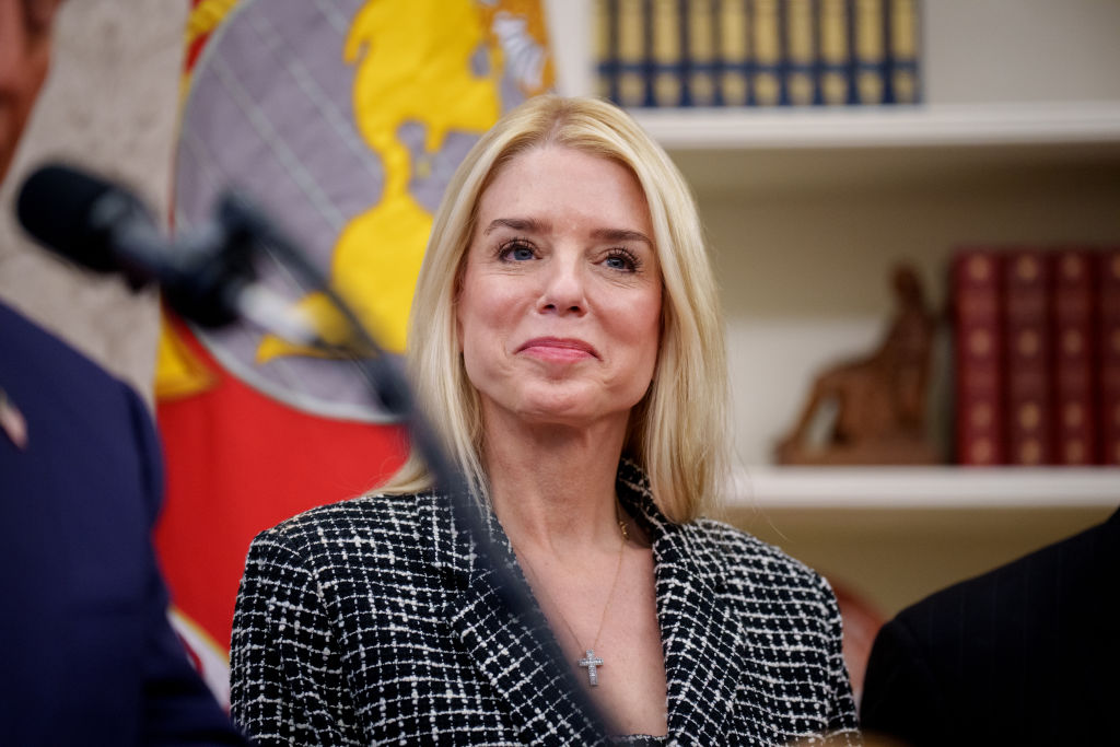 Attorney General Bondi stands shortly before being sworn in as Attorney General in the Oval Office at the White House on February 05, 2025, at Washington.