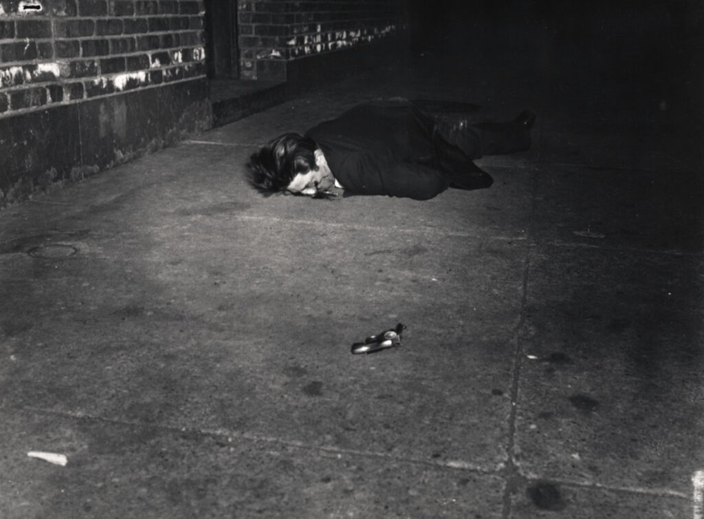 Weegee, Body of Anthony Izzo, killed by off-duty policeman Eligio Sarro, New York, February 2, 1942, International Center of Photography. Bequest of Wilma Wilcox, 1993 (2069.1993) © International Center of Photography/Getty Images