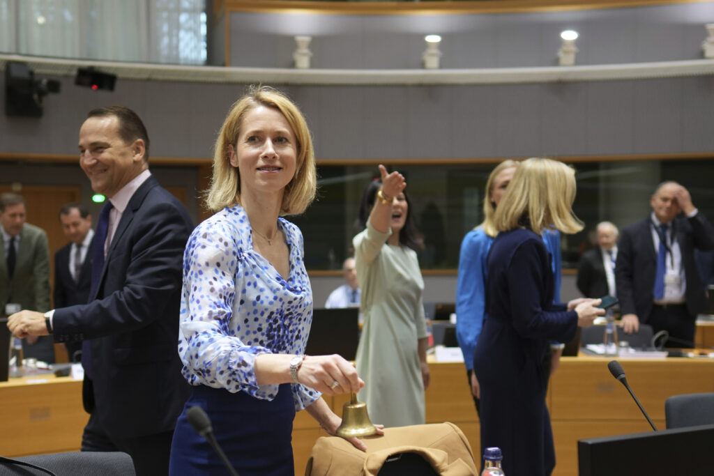 European Union foreign policy chief Kaja Kallas, center, rings a bell to signify the start of a meeting of EU foreign ministers at the European Council building in Brussels, Monday, March 17, 2025.