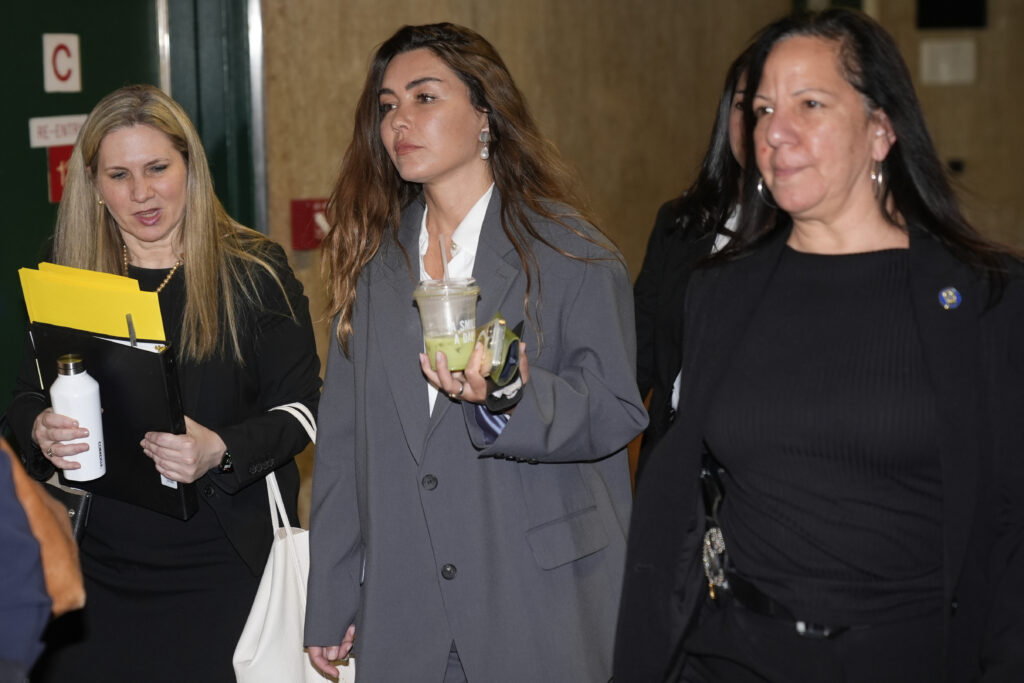 Miriam Haley, center, an accuser testifying at Harvey Weinstein's rape trial, arrives to the New York courtroom, April 29, 2025.