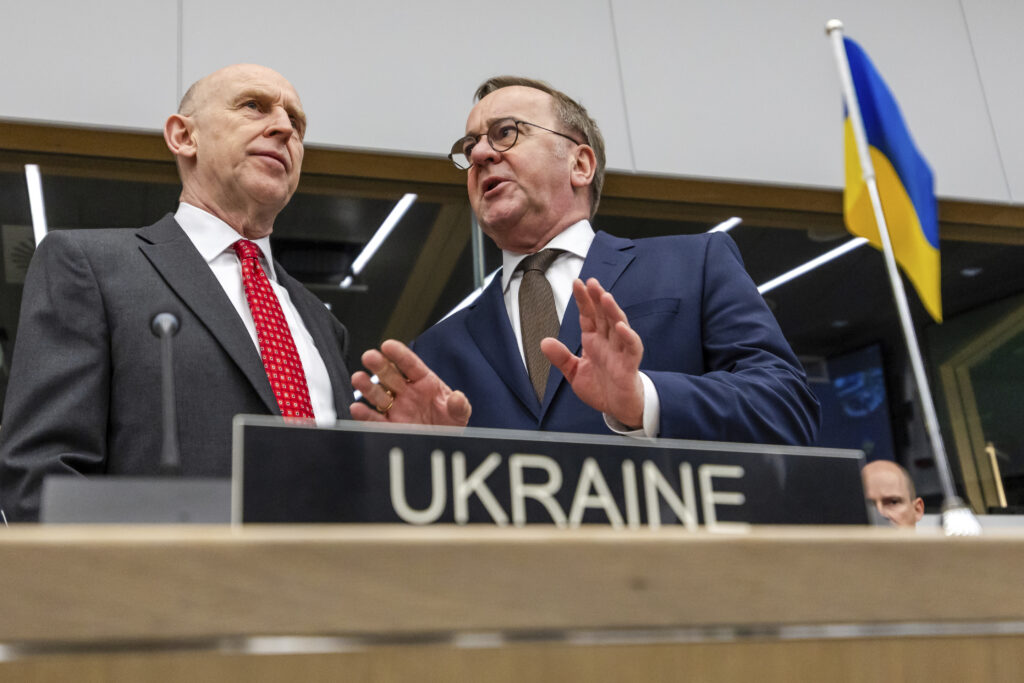 Britain's Defense Secretary John Healey, left, talks with Germany's Defense Minister Boris Pistorius during a meeting of the Ukraine Defense Contact Group at NATO headquarters in Brussels, Friday, April 11, 2025.