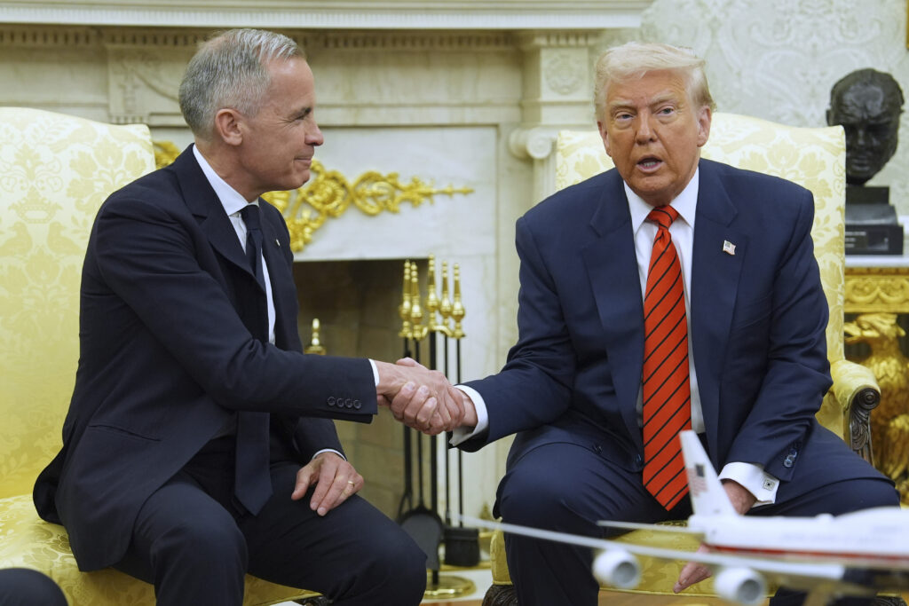 President Donald Trump meets Canadian Prime Minister Mark Carney in the Oval Office of the White House, Tuesday, May 6, 2025, in Washington.