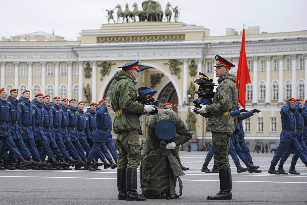 Honour guard soldiers pack caps after a rehearsal for the Victory Day military parade, which will take place at Dvortsovaya (Palace) Square on May 9 to celebrate 80 years after the victory in World War II, in St. Petersburg, Russia, Tuesday, April 22, 2025.
