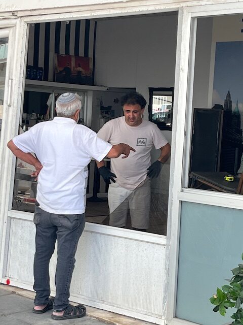 Israelis Inspect the damage from an Iranian ballistic missile attack across the street from the American Embassy Branch at Tel Aviv. June 16, 2025.