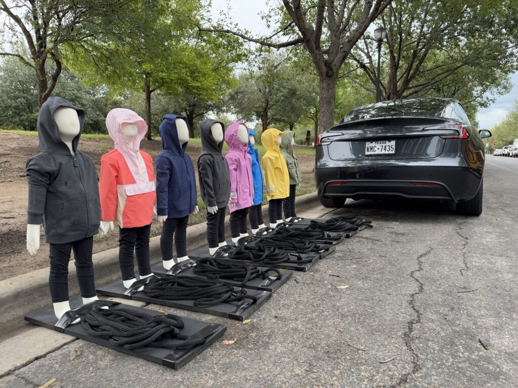 Mannequins were used to simulate children running out onto the street.