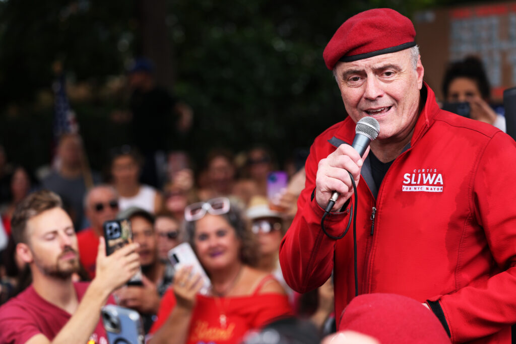 Guardian Angels founder Curtis Sliwa speaks during an anti-migrant rally and protest outside of Gracie Mansion in New York City.