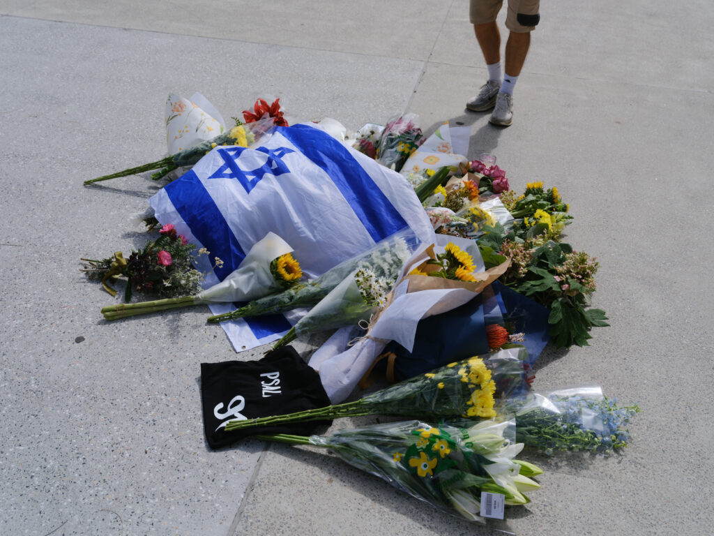Visitors to Bondi Pavilion lay flowers at Bondi Beach on December 15, 2025 in Sydney, Australia.