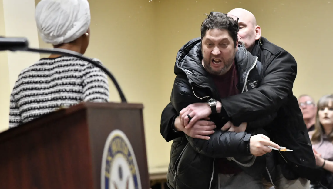 Ilhan Omar Attacked at Minneapolis Town Hall, Sprayed with Mystery Substance