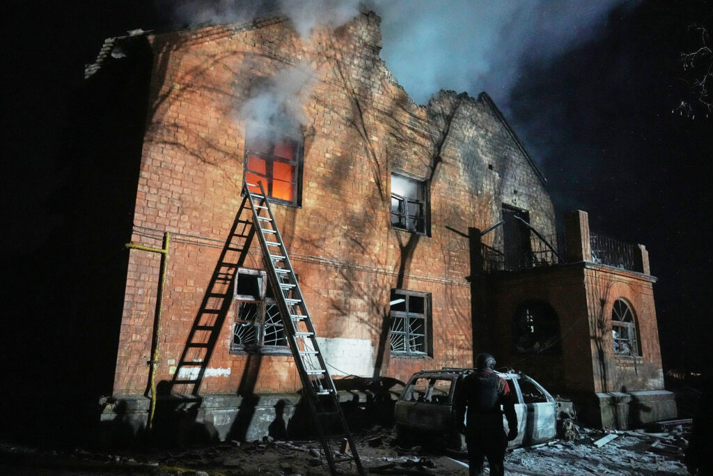 A residential building burns after a Russian strike in Kyiv, Ukraine, Friday, Jan. 9, 2026.