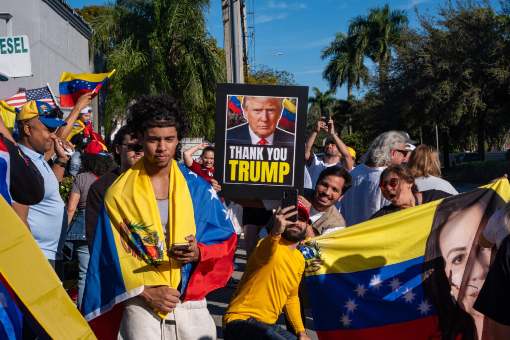 People at Doral, Florida celebrate after President Trump announced Venezuelan President Nicolás Maduro had been captured.